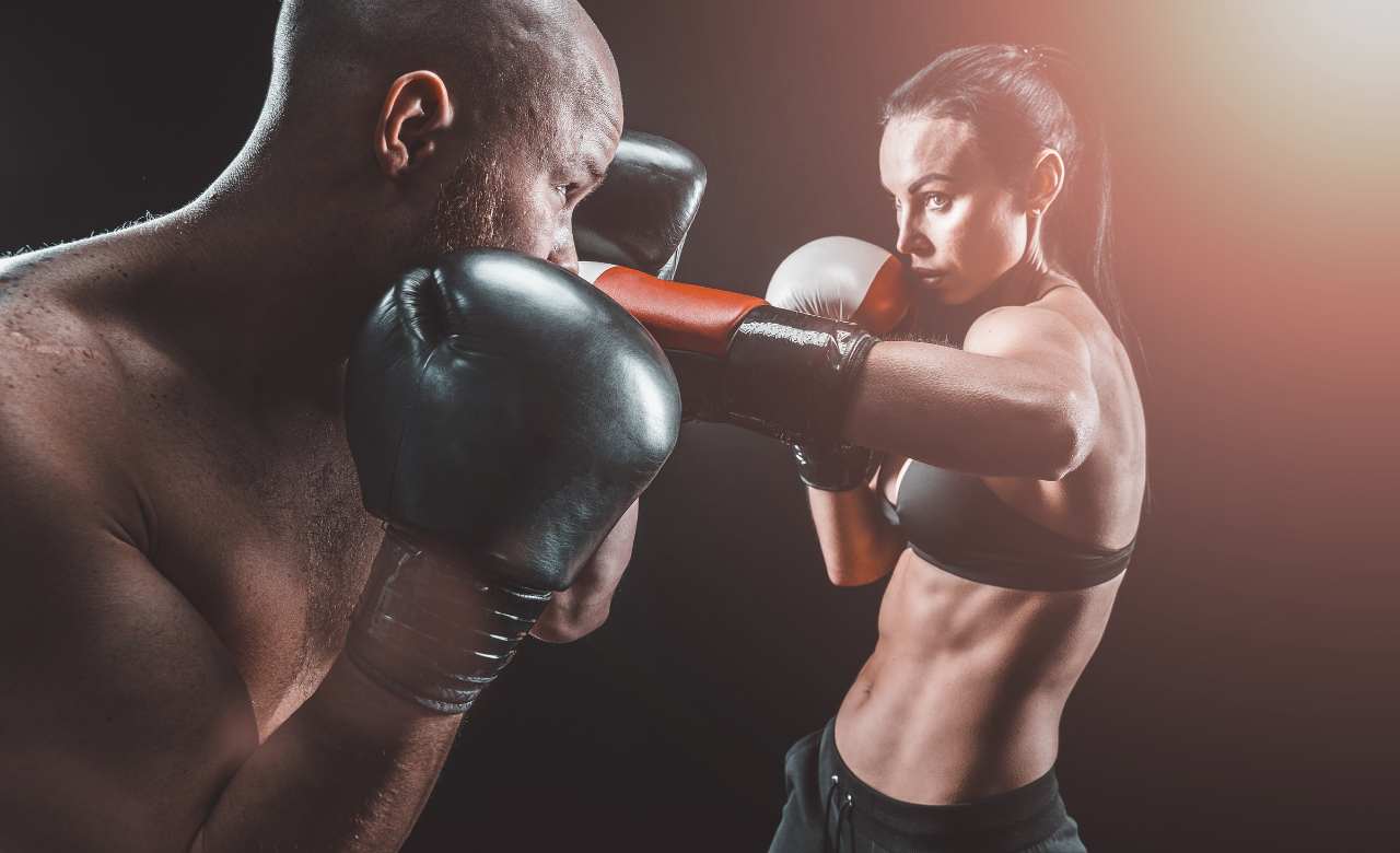 Women sparring with men